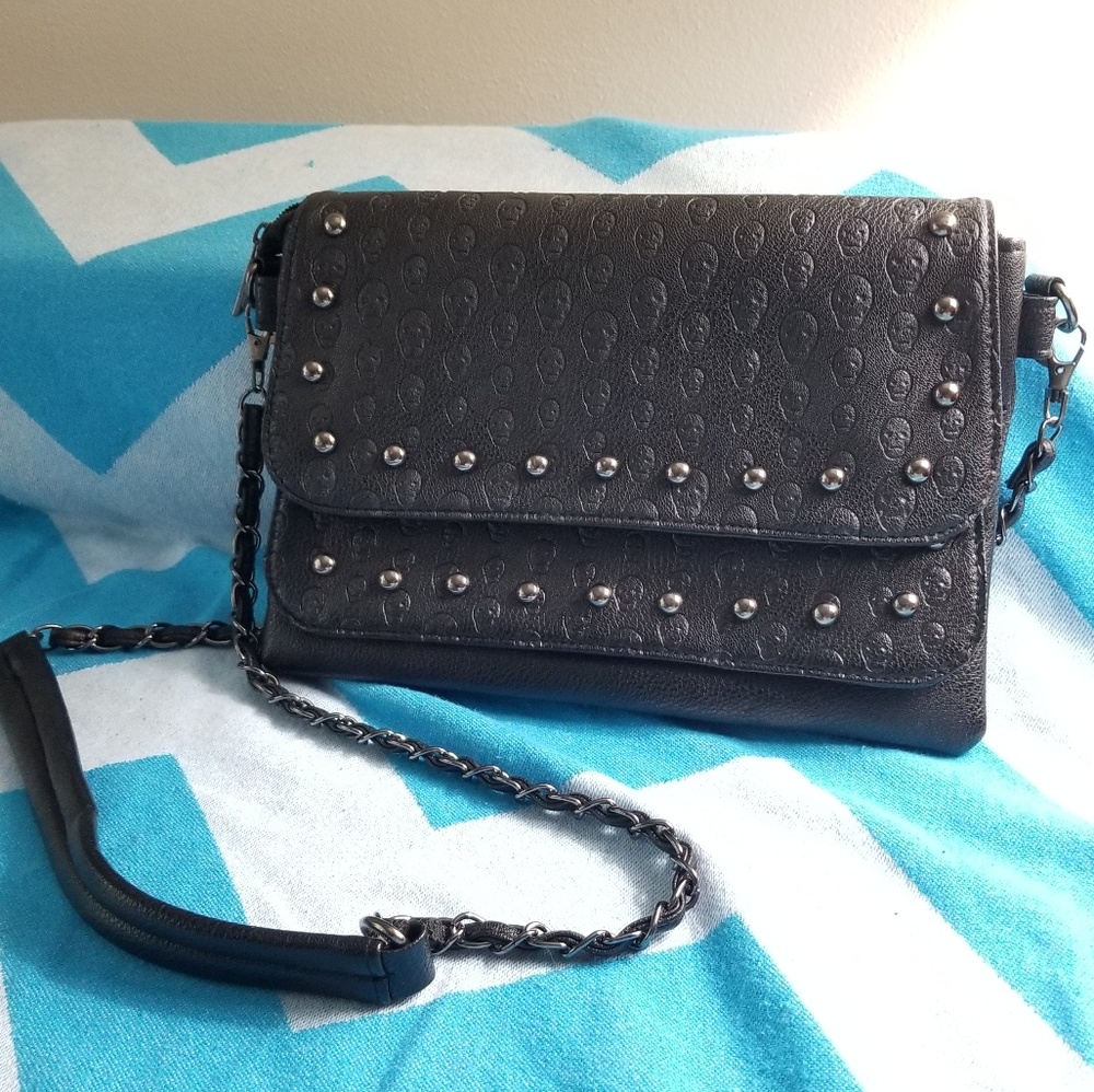 Skull embossed studded bag